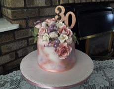 Rose Gold cake with cascading flowers.jpg